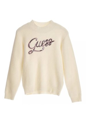 Pull de couleur crème avec un col rond côtelé, arborant un logo "Guess" pailleté en rose et argent sur le devant. Texture douce, manches longues.