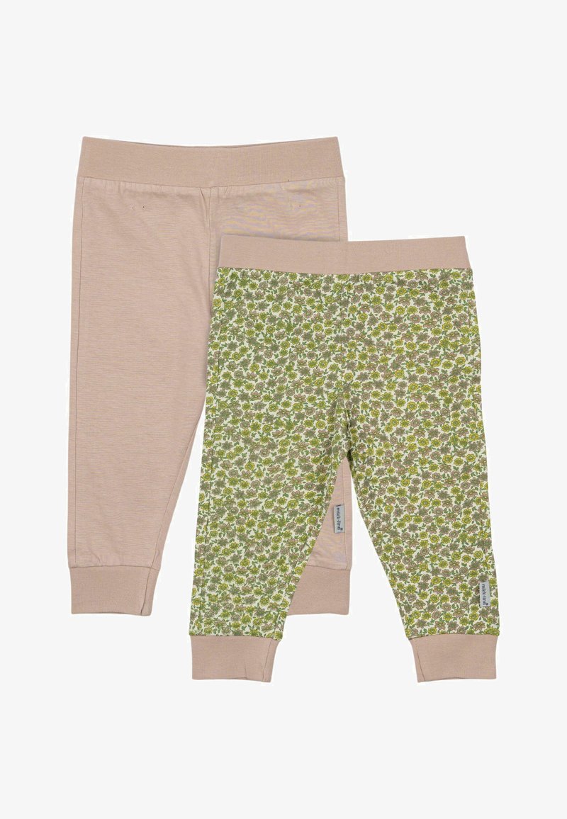 Two pairs of children's leggings: one plain light beige and one with a green floral pattern. Both feature elastic waistbands and cuffs.