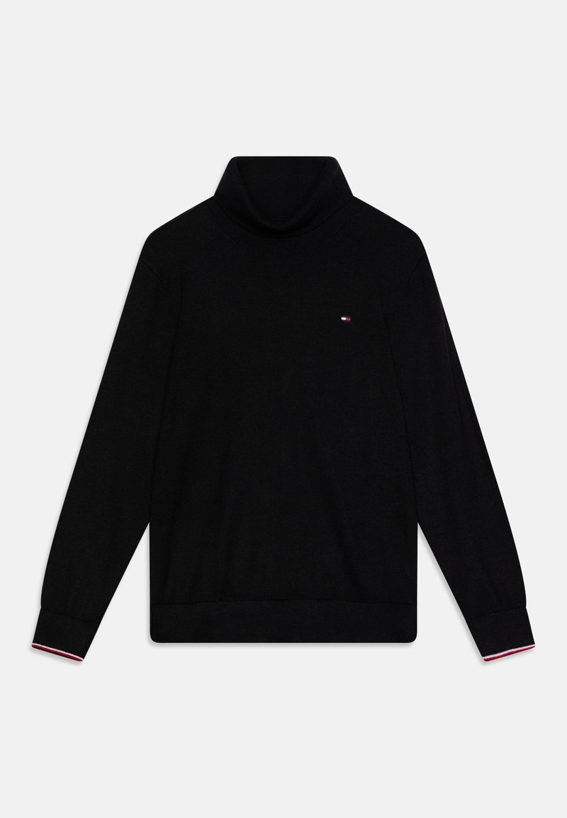 Pull à col roulé noir en tissu tricoté, avec des manches longues, des poignets côtelés et un petit logo sur la poitrine. Accents rouge et blanc au niveau des poignets.