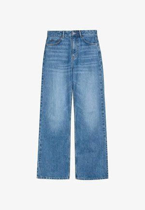 Jeans o szerokich nogawkach wykonane z jasnoniebieskiego denimu. Posiadają pięć kieszeni, zamek błyskawiczny z guzikiem oraz przeszycia wzdłuż szwów.