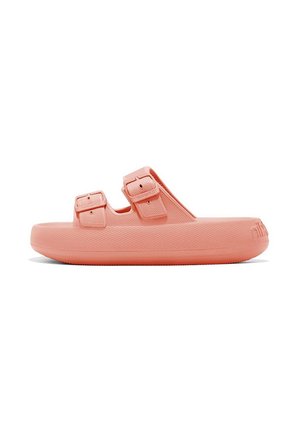 Sandal de color rosa pastel con dos hebillas ajustables, con una suela gruesa y superficie texturizada para mayor agarre.