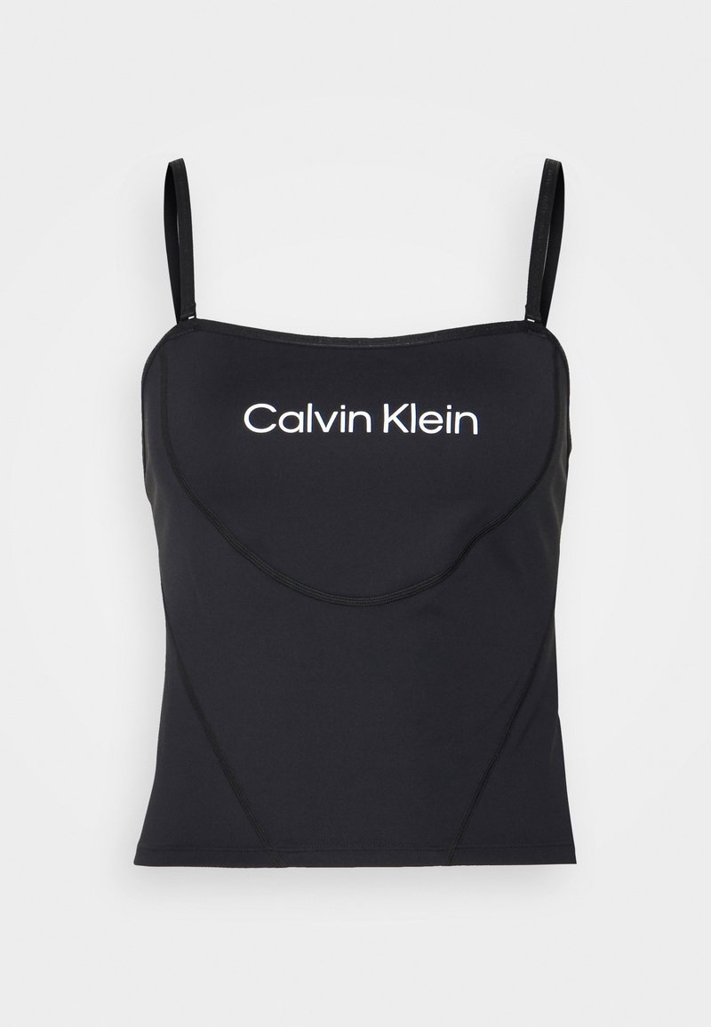 Haut caraco noir ajusté avec fines bretelles et logo "Calvin Klein" blanc centré sur la poitrine sur fond uni.