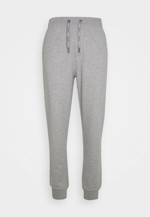 Grijze sweatpants van zachte stof, met een elastische tailleband met trekkoorden en ribbelboorden bij de enkels.