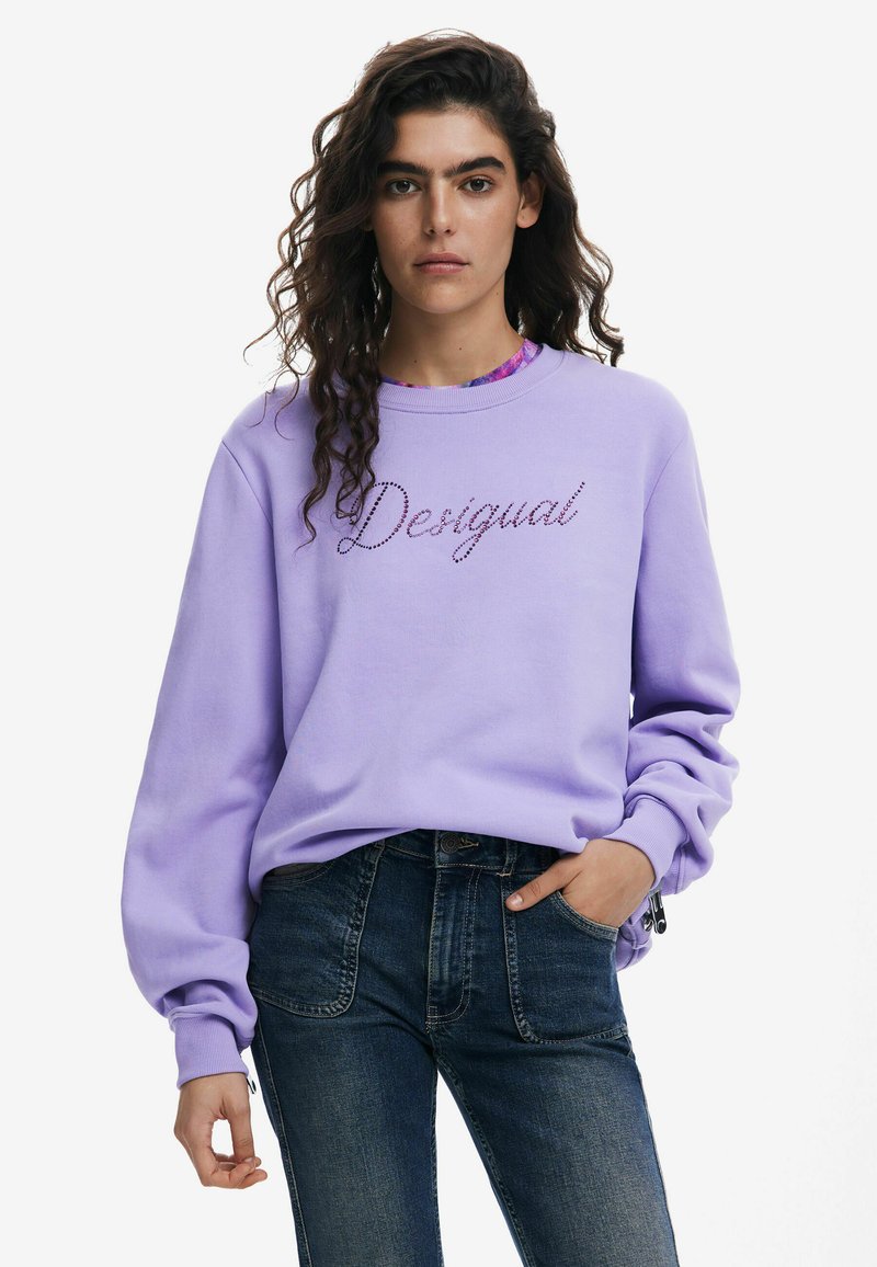 Paarse sweatshirt met een relaxte pasvorm, met de opdruk "Desigual" in een glanzend ontwerp. Lange mouwen, ribgebreide manchetten en een zachte stofstructuur.