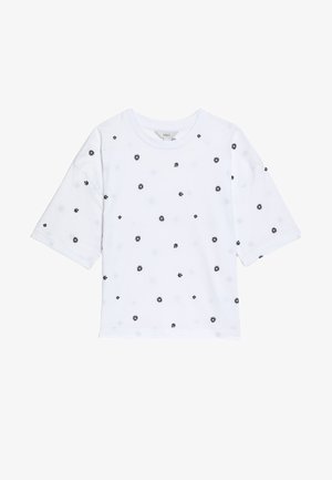 Witte T-shirt met korte mouwen, voorzien van zwarte bloemenpatronen, ronde halslijn en een losse pasvorm. Gemaakt van een zachte, ademende stof.