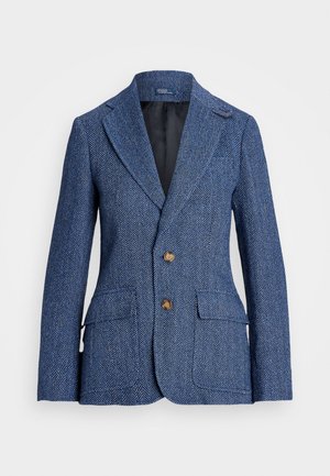 Herringbone-patterned blue blazer made of textured fabric. Features notched lapels, two front pockets, and brown buttons. Lined interior.