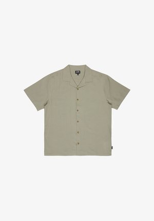 Kurzärmeliges Hemd mit Kragen in hellem Olivgrün, mit durchgehender Knopfleiste, weichem Stoff und lockerem Schnitt. Dezente Nahtdetails.
