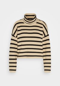 Pull à col roulé rayé en crème et noir, avec une texture côtelée et un design court, présentant des découpes aux épaules et des manches longues.