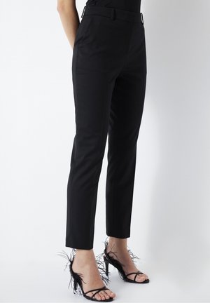 Spodnie materiałowe