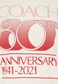 COACH T-shirt med print - light yellow