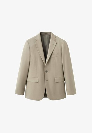 Beżowa, dopasowana marynarka na jedno zapięcie, z wyciętymi klapami, dwoma przednimi kieszeniami oraz kieszenią wewnętrzną, wykonana z gładkiej tkaniny o fakturze.