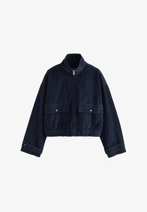 Cropped navy corduroy jacket with a high collar, front zip, two large flap pockets, and elasticized hem and cuffs.