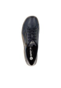 Chaussure en cuir bleu marine avec un bout rond, un laçage rond, une fermeture éclair sur le côté et une semelle en caoutchouc contrastante marron clair. L'intérieur est équipé d'une semelle intérieure noire avec une marque.