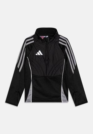 Pullover sportivo nero con colletto alto, zip frontale a metà, strisce grigie sulle maniche e logo bianco sul petto. Tessuto liscio e elasticizzato.