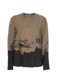 Blusa a maniche lunghe in beige e nero con scollatura a V. Presenta un design astratto floreale nero nella parte superiore e una sezione inferiore nera uniforme.