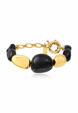 Bracelet avec de grosses perles ovales lisses noires et dorées irrégulières alternées et une chaîne dorée avec un fermoir rond à bascule.