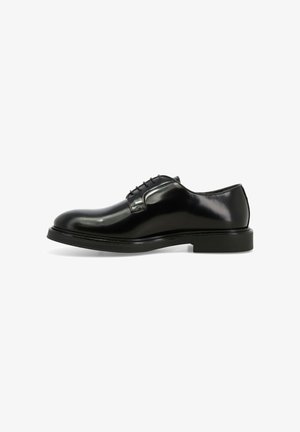 Scarpe eleganti in pelle nera con punta arrotondata, chiusura con lacci, finitura liscia e suola piatta in gomma. Design minimalista con dettagli di cucitura discreti.