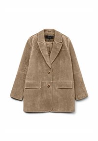 Blazer en velours côtelé beige avec un col cranté, deux poches avant et deux boutons. Texture douce, coupe décontractée et doublure lisse.