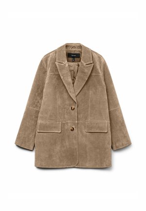 Bēšs kordurojas žakete ar izgrieztu apkakli, divām priekšējām kabatām un divām pogām. Mīksta tekstūra, brīvs piegriezums un gluda odere.