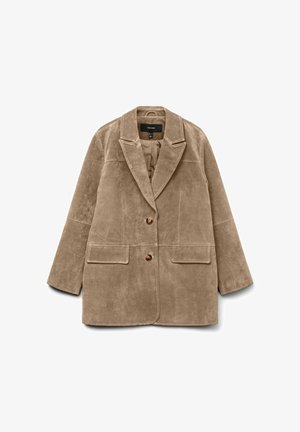 Bēšs kordurojas žakete ar izgrieztu apkakli, divām priekšējām kabatām un divām pogām. Mīksta tekstūra, brīvs piegriezums un gluda odere.