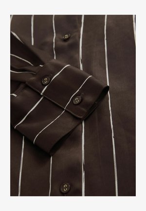 Brown striped shirt with white vertical lines, smooth fabric, long sleeves, buttoned cuffs, featuring dark brown buttons and tailored design.