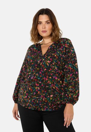Blouse noire à motifs floraux avec de longues manches ballon, décolleté en V et motif floral multicolore. Tissu doux avec des détails de texturation subtils.