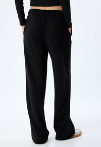 Koton Pantalones deportivos - black