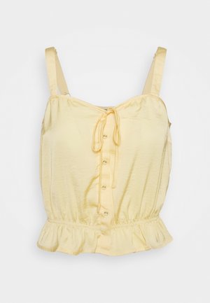 Jasnożółty top bez rękawów z cienkimi ramiączkami, guzikami z przodu, wiązaniem przy dekolcie, talią dopasowaną i falbanianym dołem.