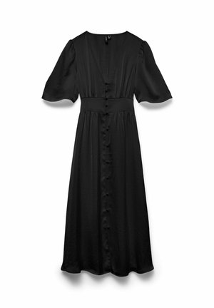 Mustast siidjast kangast pikk maksiseelik, millel on lühikesed kellukakujulised varrukad, liibuv vöökoht ja nööbitav esikülg kaelast allservani.