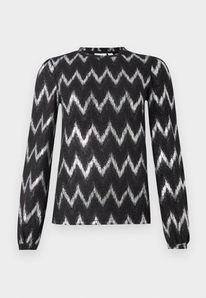 Haut à manches longues noir et argent métallique avec un motif en zigzag, doté d'un col rond et de manches bouffantes. Tissu texturé doux.