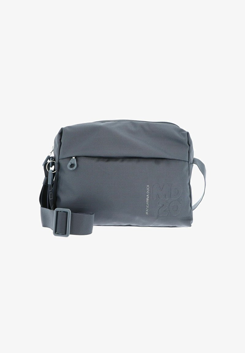 Gray textile shoulder bag with a smooth surface, front pocket, adjustable strap, and logo detail on the side. Compact rectangular shape.