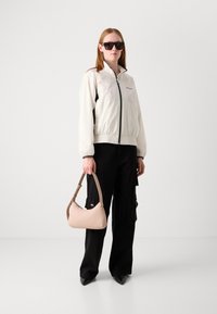Calvin Klein Jeans RETRO TRACK JACKET - Training jacket - tofu
