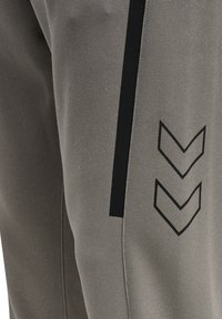 Hummel CIMA XK PANTS - Jogginghose - grey melange