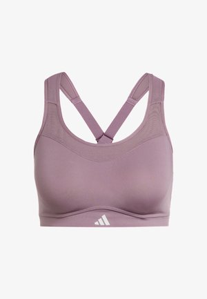 Brassière de sport lilas à texture lisse, bretelles larges en design croisé, avec un logo blanc sur la bande.
