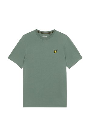 T-shirt in cotone verde con maniche corte. Presenta un piccolo logo di un uccello giallo e nero sul lato sinistro del petto. Design semplice con scollo rotondo.