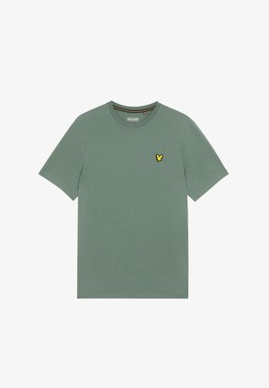 T-shirt en coton vert à manches courtes. Présente un petit logo d'oiseau jaune et noir sur la poitrine gauche. Design simple à col rond.
