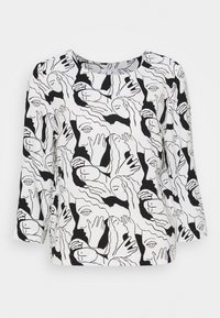 Maglia a maniche lunghe con scollo rotondo in tessuto leggero, caratterizzata da un motivo astratto in bianco e nero con volti e mani. Texture liscia e vestibilità comoda.