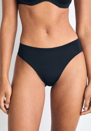 Black bikini briefs with a smooth texture, high waist design, and minimalistic cut. Material appears stretchy and form-fitting.