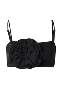Zwart crop top met een grote satijnen bloemenapplicatie aan de voorkant, met verstelbare spaghetti bandjes en een zachte stofafwerking.