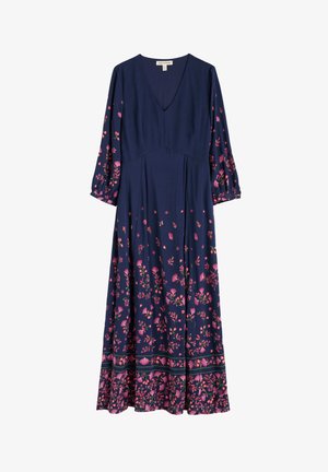 Marineblauwe jurk met een V-hals, lange pofmouwen en bloemmotieven in roze en groen langs de zoom en mouwen. Gemakkelijke stoftextuur.