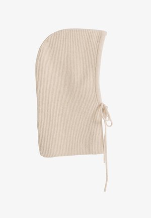 Pasamontañas de punto acanalado beige con cierre lateral de lazo, diseñado para cubrir la cabeza y el cuello y proporcionar calor.