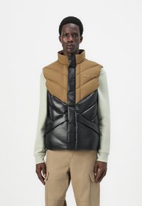 Helly Hansen VILLAGE PUFFY VEST UNISEX - Liemenė - sepia