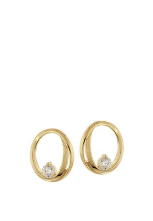 Pair of gold oval hoop earrings each featuring a single small round clear gemstone at the bottom inside edge.