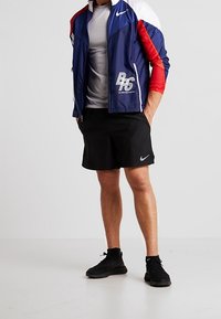 Nike Performance Chaqueta de running - dark blue