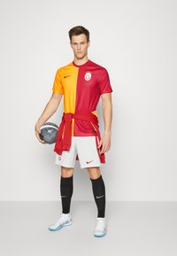 Nike Performance GALATASARAY ISTANBUL FOOTBALL HOME - T-shirt de sport - orange