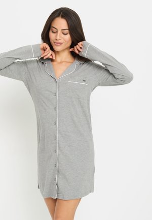 Gray nightdress featuring long sleeves, button closure, collar, and a chest pocket with white piping details. Soft, lightweight fabric.
