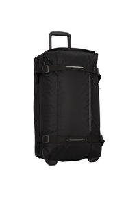 Sac de voyage noir à roulettes avec un tissu texturé, une poignée rétractable robuste, des sangles de compression latérales et une poche zippée à l'avant.