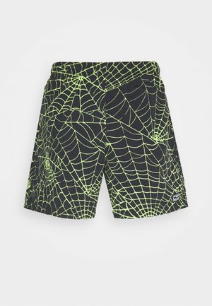 Czarne spodenki z jasnym zielonym wzorem pajęczyny i elastycznym pasem, małe prostokątne logo na dolnej przedniej prawej stronie.