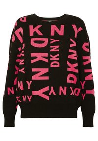 Pull noir avec tissu texturé et grandes lettres roses "DKNY" en motif répétitif audacieux. Coupe décontractée avec épaules tombantes.