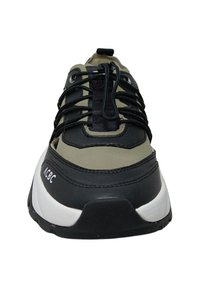 Black and olive green athletic shoe with a rounded toe, textured upper, laces, and white midsole detailing. Features ACBC logo on side.